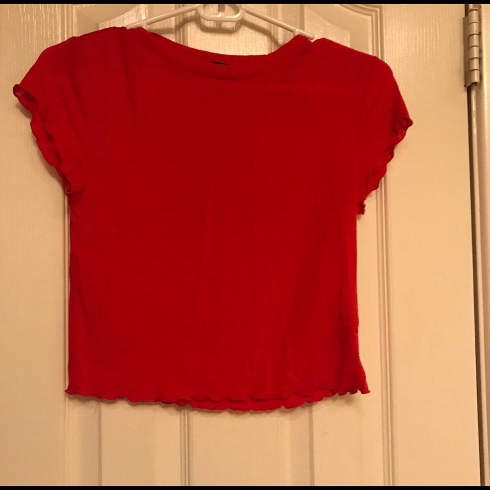 red ruffled short sleeve shirt